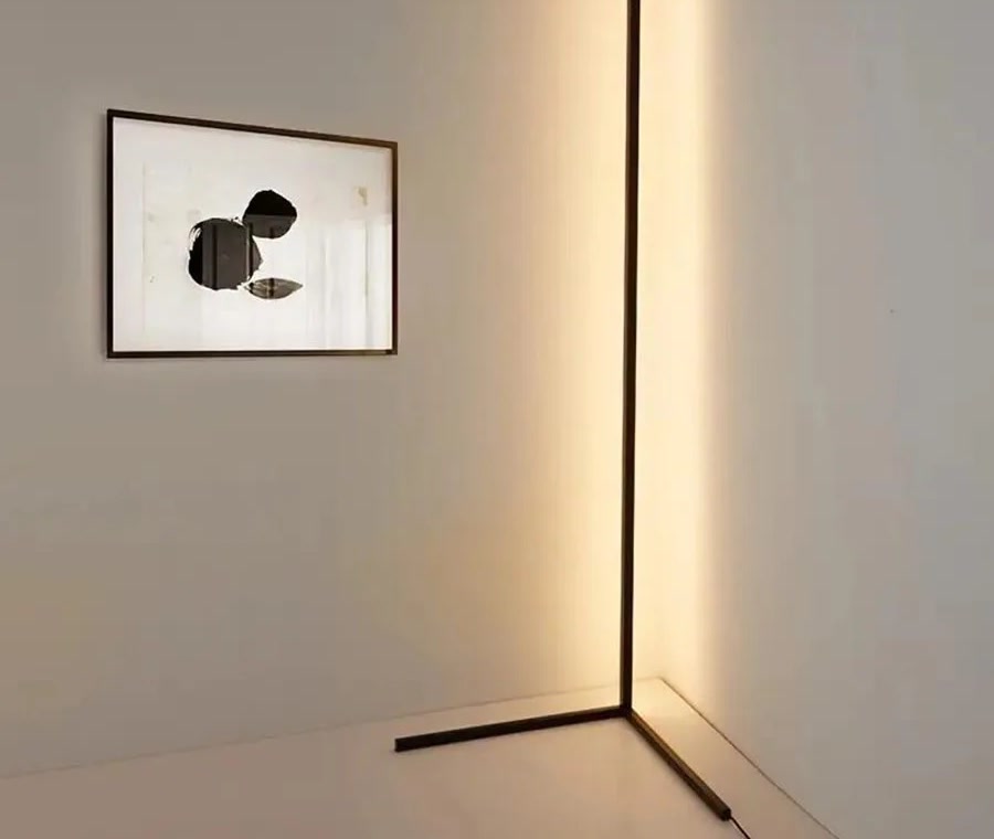 Golden Hour corner floor lamp washing a wall in warm light