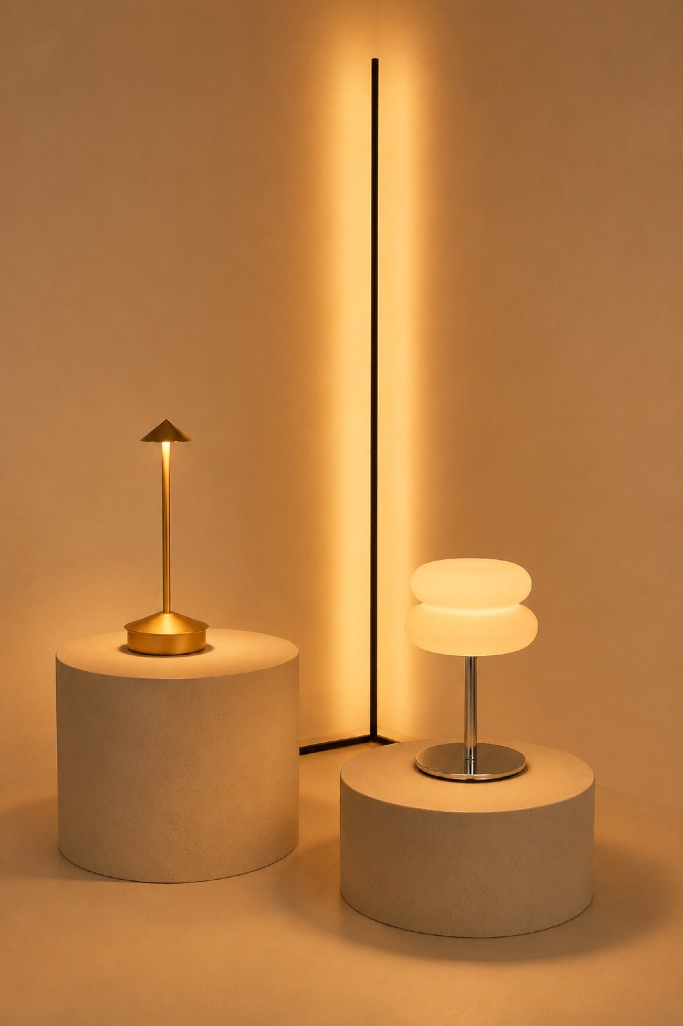 The Whole-Room Glow set: Wren, Golden Hour and Mushroom lit together on porcelain plinths