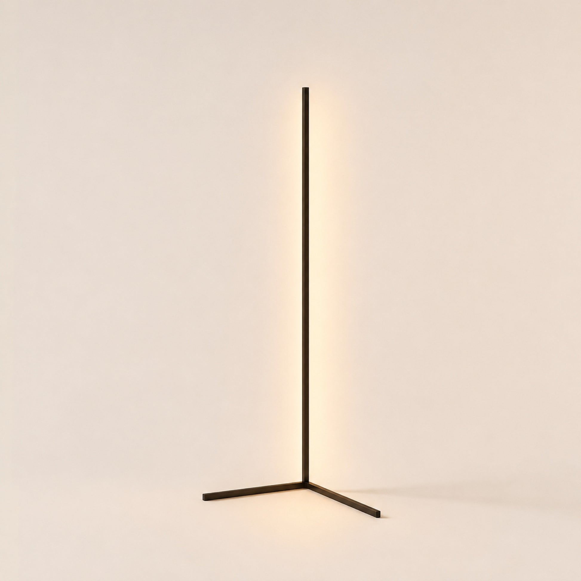 Golden Hour corner floor lamp lit on warm porcelain studio background