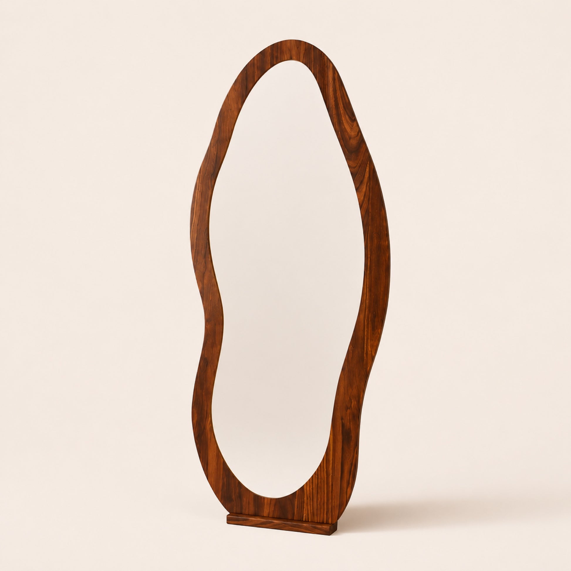 The Wave wavy walnut full-length mirror on warm porcelain studio background