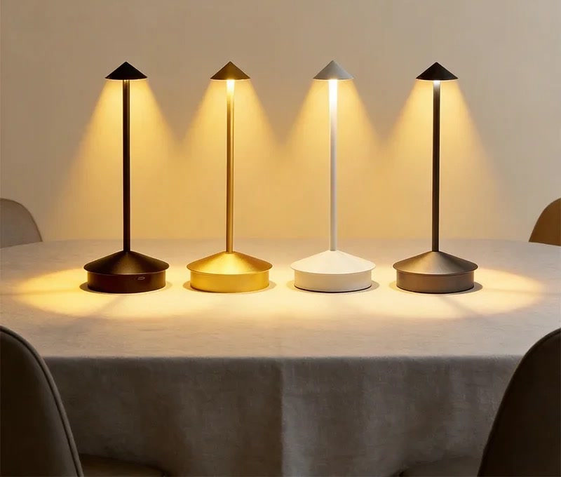 Wren lamps lighting a restaurant table after dark
